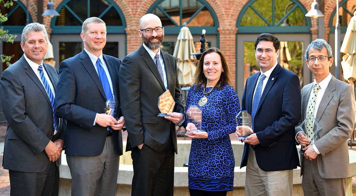 Left to right: Dean Rudy Buchheit, John Balk, Bradley Berron, Isabel Escobar, Matthew Beck, T.W. Wu