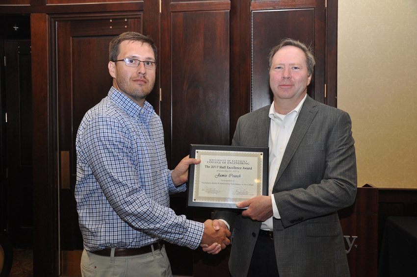 Jamie Creech winner of a Staff Excellence Award, non-exempt category, with Dean Larry Holloway