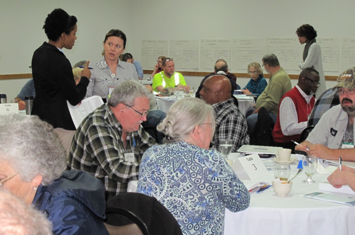 Attendees at a previous workshop work on issues such as operational optimization and resiliency, infrastructure stability, community sustainability and economic development, financial viability, and employee and leadership development.