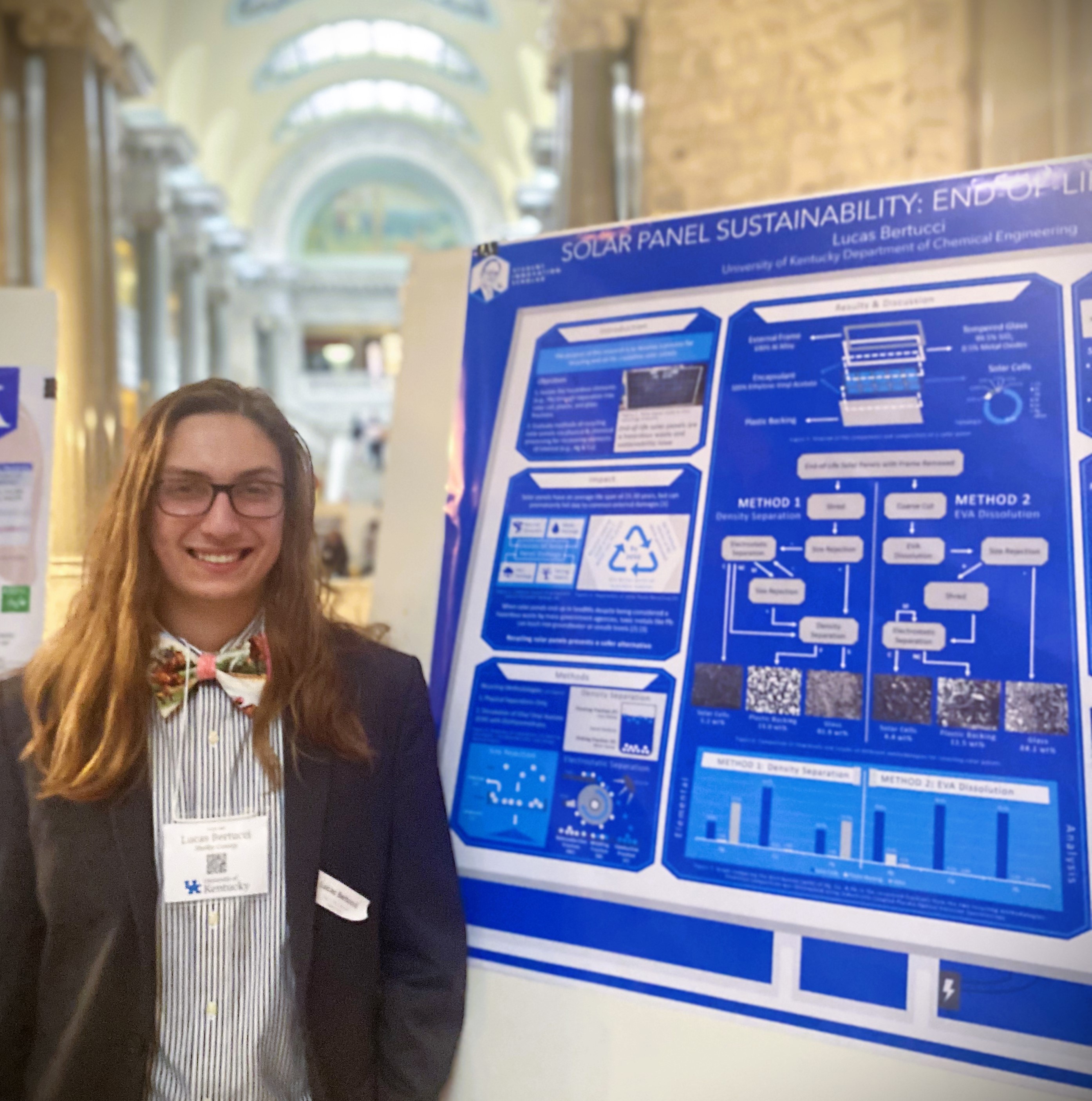 Senior Lucas Bertucci with his research poster in Frankfort.