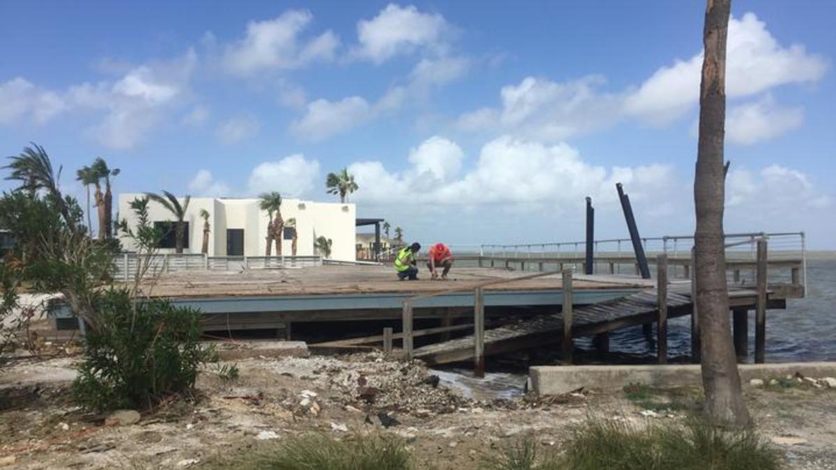 Workers assessing Harvey damage